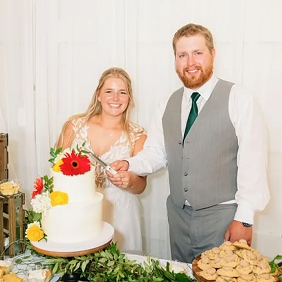 Groom and Bride cutting cake